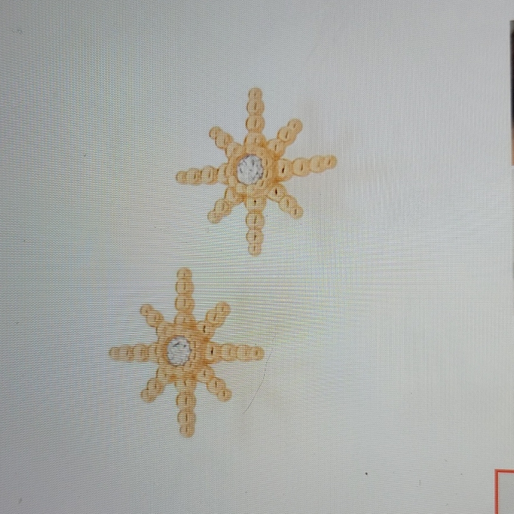 Gold sun rays earrings